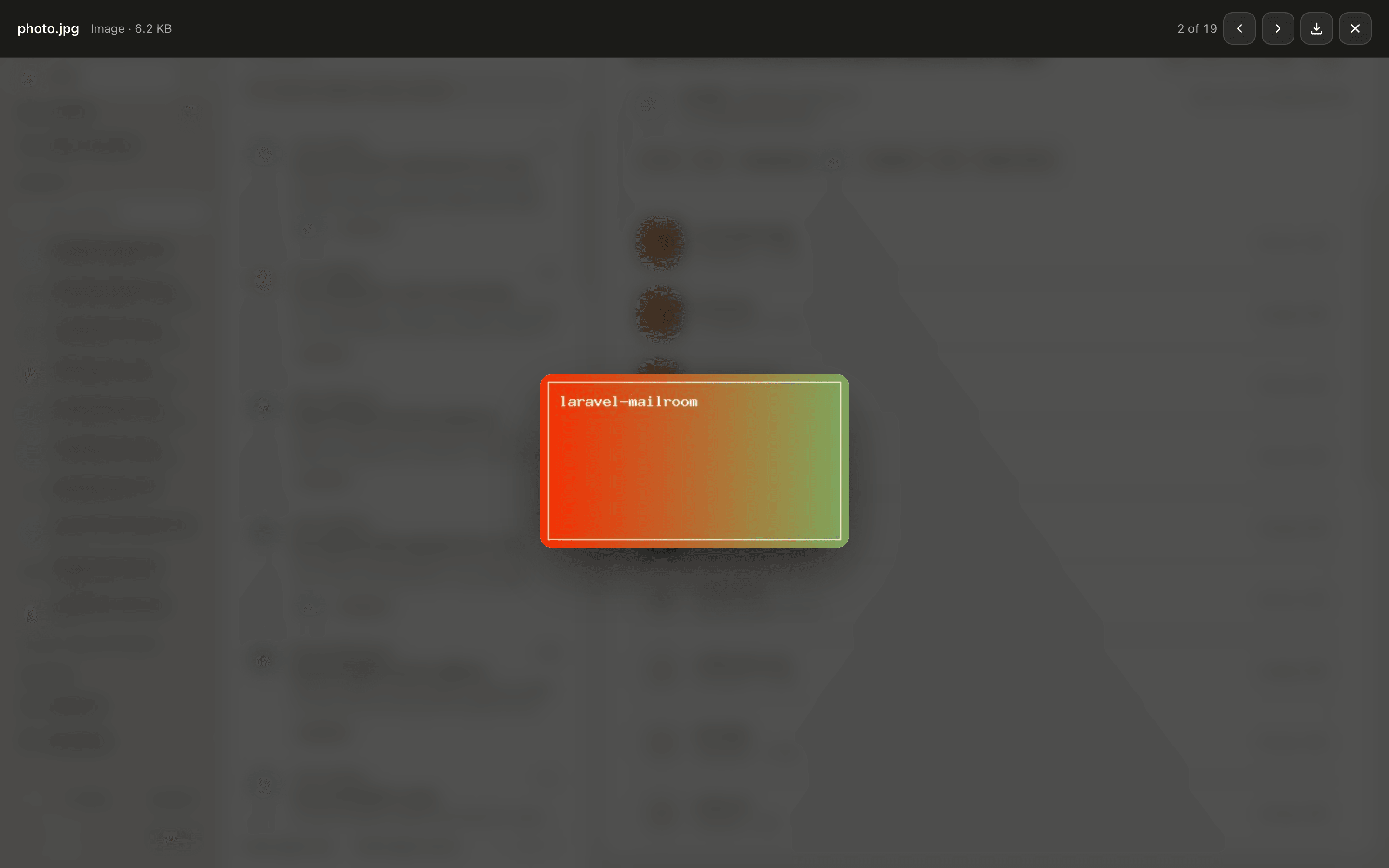 An attachment open in the preview lightbox, with its name, type and size, previous and next buttons, download and close